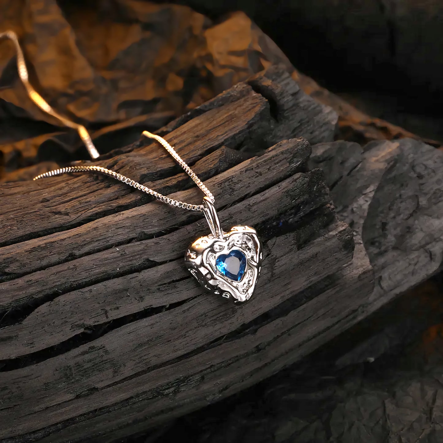 Sterling Silver Artisan Heart Necklace with Blue Diamond